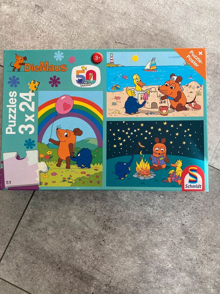 Die Maus 50 Jahre Jubiläumsedition Puzzle von Schmidt Spiele, dreiteilig, für Kinder ab 3 Jahren mit Nacht- und Strandbildern